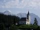 Kostelk (Sv.Duh) v Podolev. Za nm st hebene Kamnickch a Savinjskich Alp 